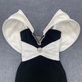Sexy Women's Dress With Large Shoulders In White And a Cinched Waist With a v-Neck, Long Backless Bandage, And a Long Dress For
