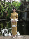 Dress Qipao 2026 New Velvet Cheongsam Skirt Autumn and Winter Yellow Inverted Large-sleeved Cheongsam