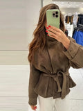 Women Suede Jacket Stand Collar Asymmetric Button Belted Waist Peplum Hem Long Sleeve Loose Retro Casual Outerwear Fashion Coat