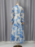 French Vacation Style Floral Print Dress for Women Tie Neck Waist Belt Asymmetrical Ruffle Hem Skirt for Outdoor Photoshoot