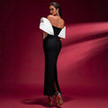 Sexy Women's Dress With Large Shoulders In White And a Cinched Waist With a v-Neck, Long Backless Bandage, And a Long Dress For